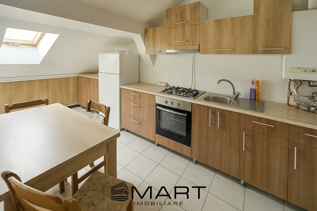 Apartament la mansarda cu 3 camere 100mp zona Tilisca