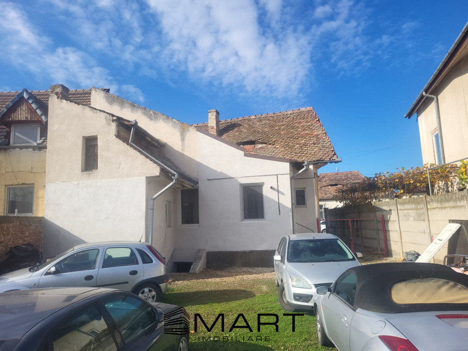 Casa individuala si curte de 480 mp zona Piata Cluj