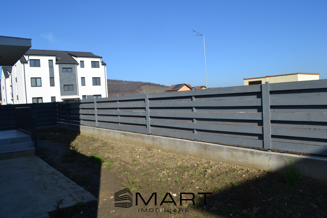 Duplex modern cu grădină și două locuri de parcare