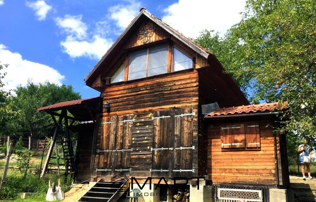 Casa de vacanta cu teren 640mp Tropinii Noi